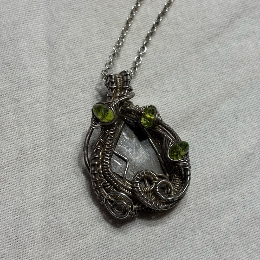 Meteorite pendant by artist Heather Jordan